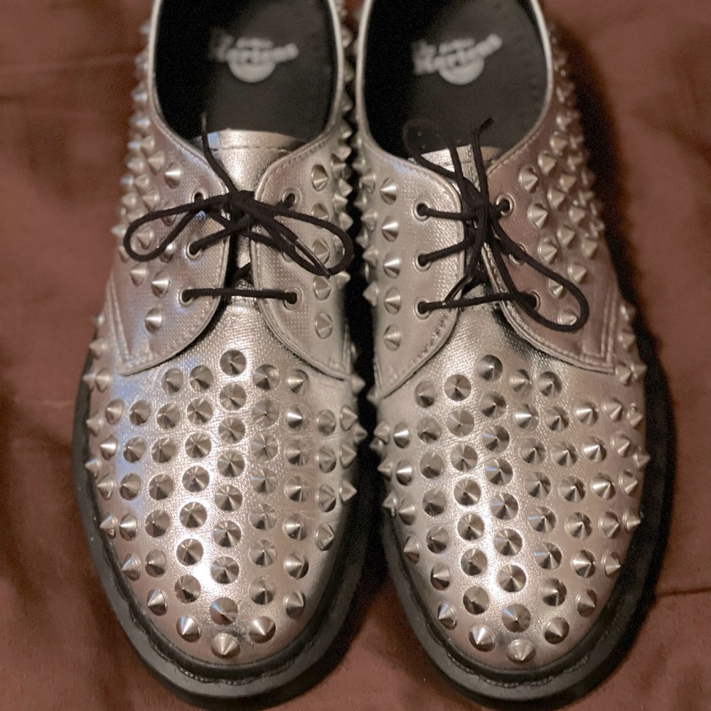 Dr. Martens in new condition. Only worn a couple of times. Silver studded.